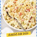 A serving bowl of gluten-free macaroni salad with creamy dressing