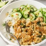 Peanut chicken bowls with ground chicken, jasmine rice, cucumber salad, and peanut sauce
