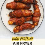 A plate of crispy bacon-wrapped chicken tenders brushed with BBQ sauce