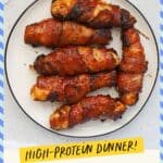 A plate of crispy bacon-wrapped chicken tenders brushed with BBQ sauce