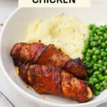 A plate of bacon-wrapped chicken tenders with mashed potatoes and peas