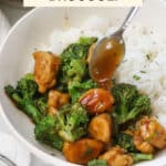 Drizzling sauce over a bowl of chicken & broccoli stir fry