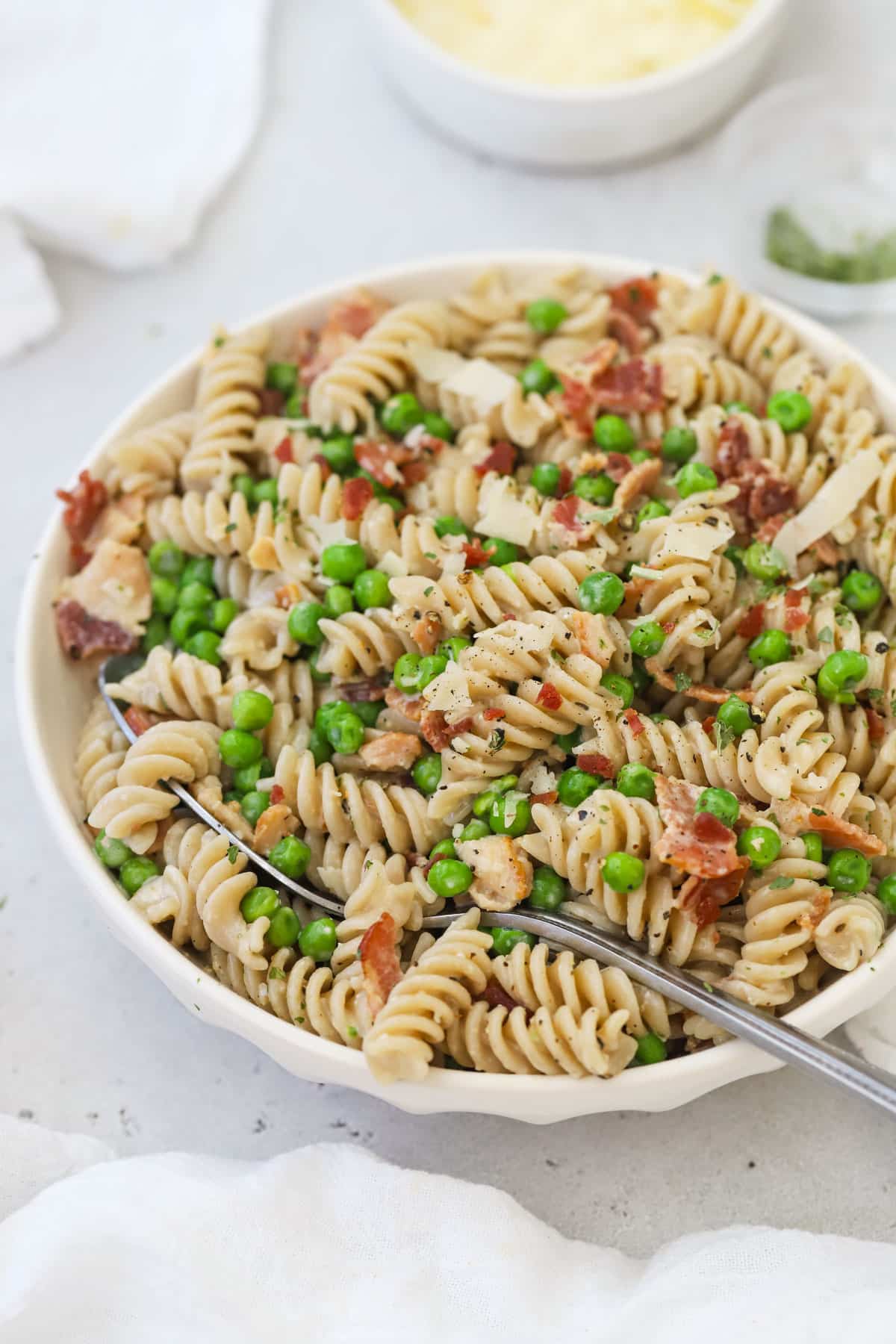 Parmesan pasta with peas and bacon.